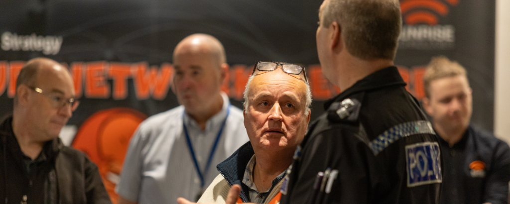 Attendees at Sunrise Technologies’ Basildon cybersecurity workshop working in groups to identify how a simulated hack occurred, led by Essex Police.